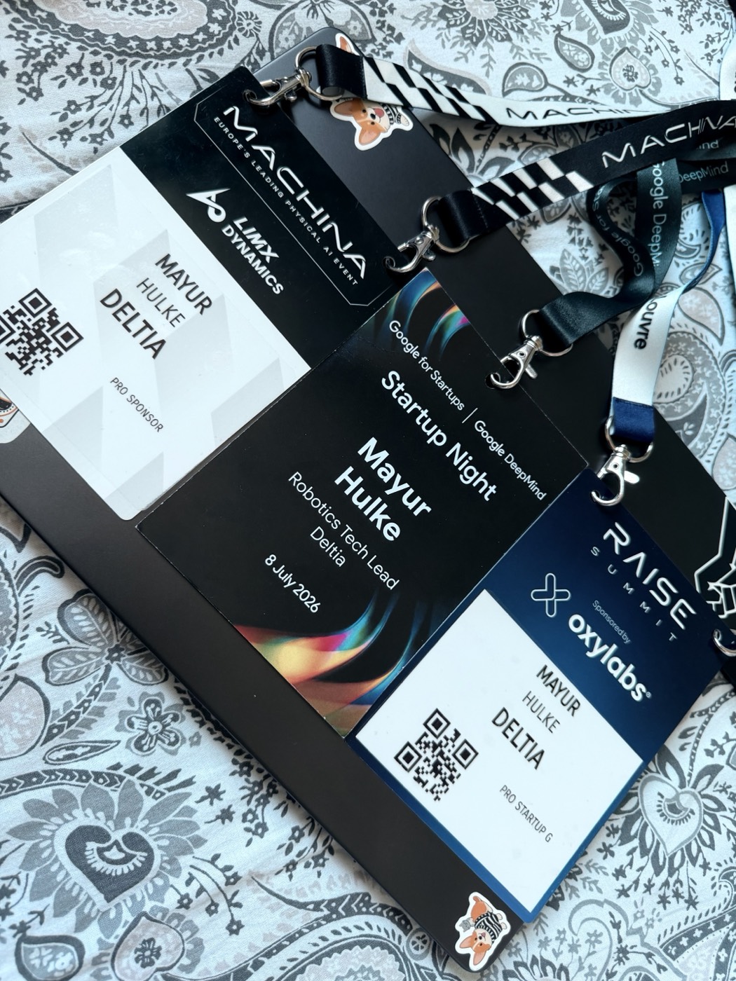 Event badges from MACHINA, Google DeepMind Startup Night and RAISE Summit